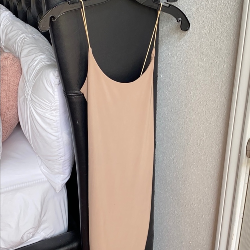 Selling nude bodycon dress